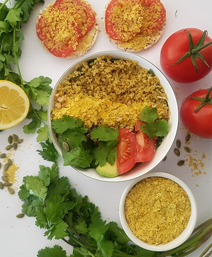 nutritional yeast flakes sprinkled on food