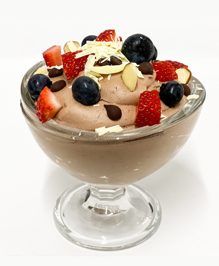 nzprotein plant mousse served in a glass bowl with fruit