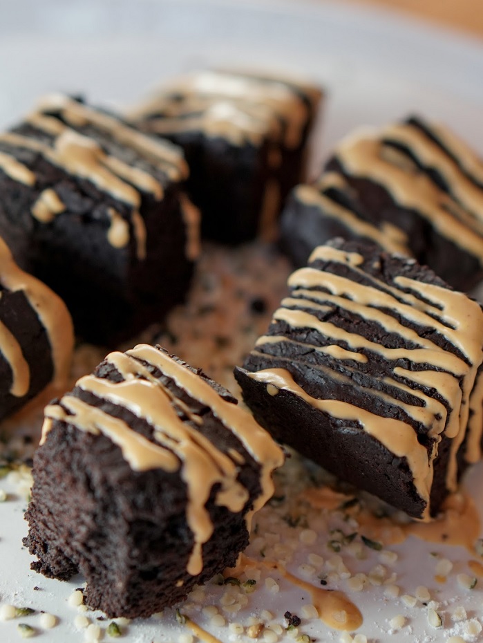 hemp protein based brownies drizzled with powdered peanut butter