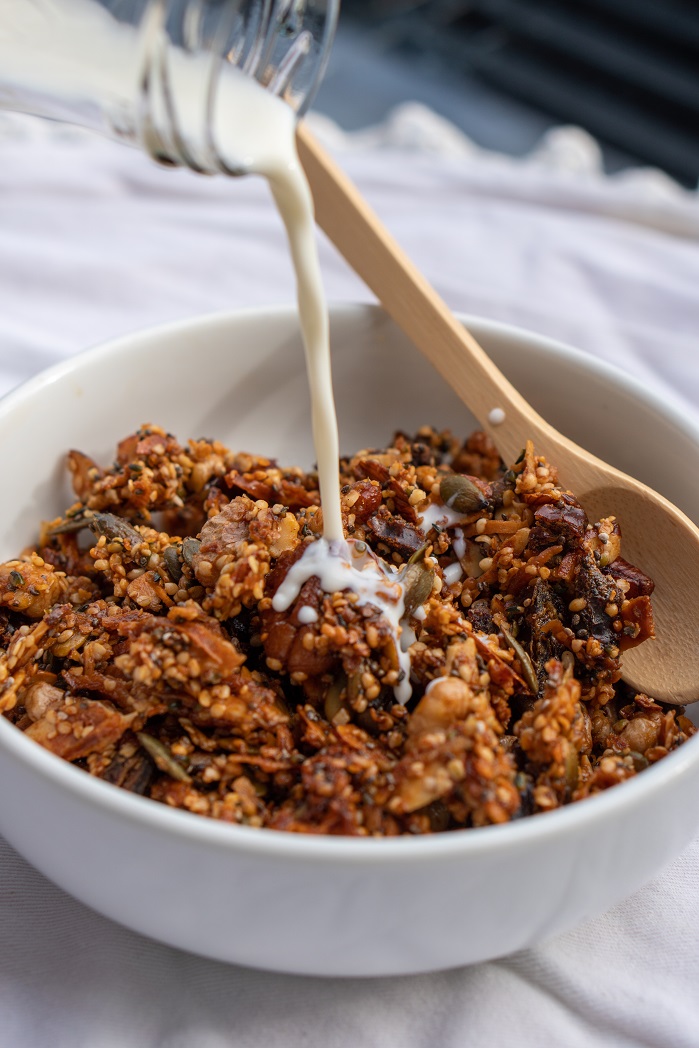 hemp muesli in bowl with milk