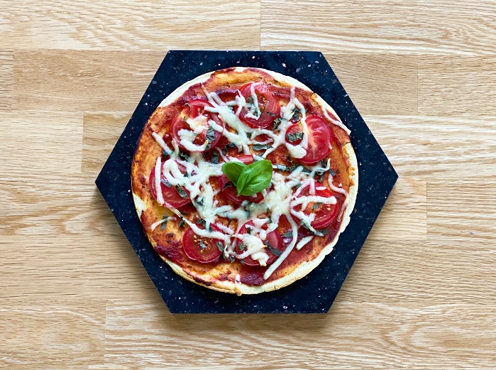 whey protein pizza on wooden board