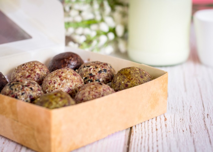 beef protein balls in a cardboard tray