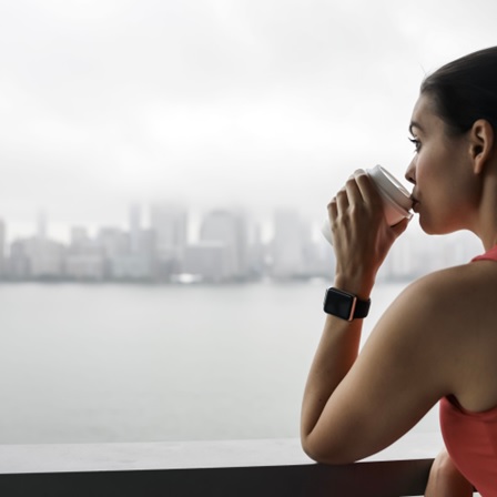 woman drinking a cup of coffee stock image