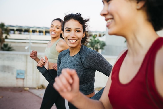 group of women out for a social run stock image