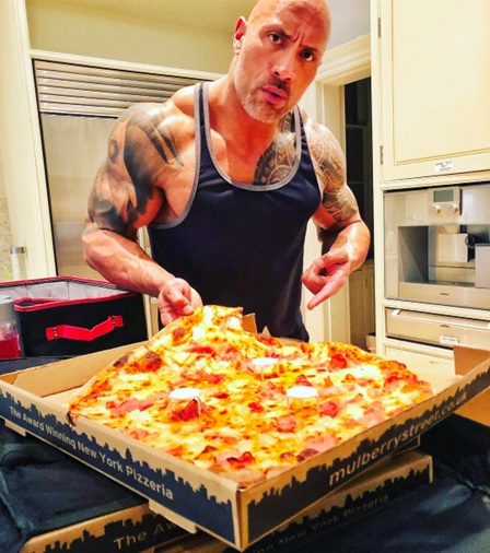 the rock with a large pizza stock image