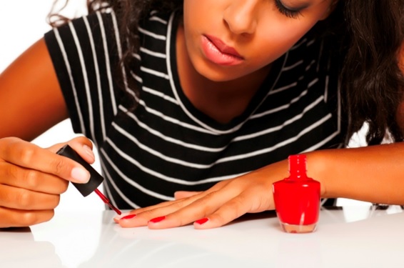 woman painting her nails stock image