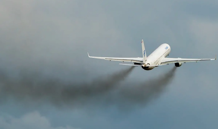 jet aircraft with smoke
