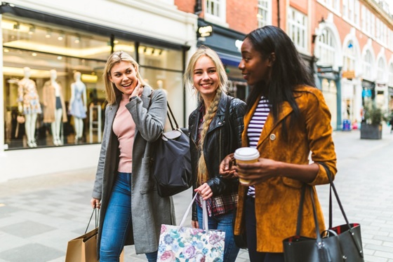 friends shopping together stock image