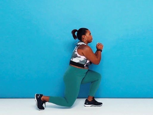 woman doing free weight lunges