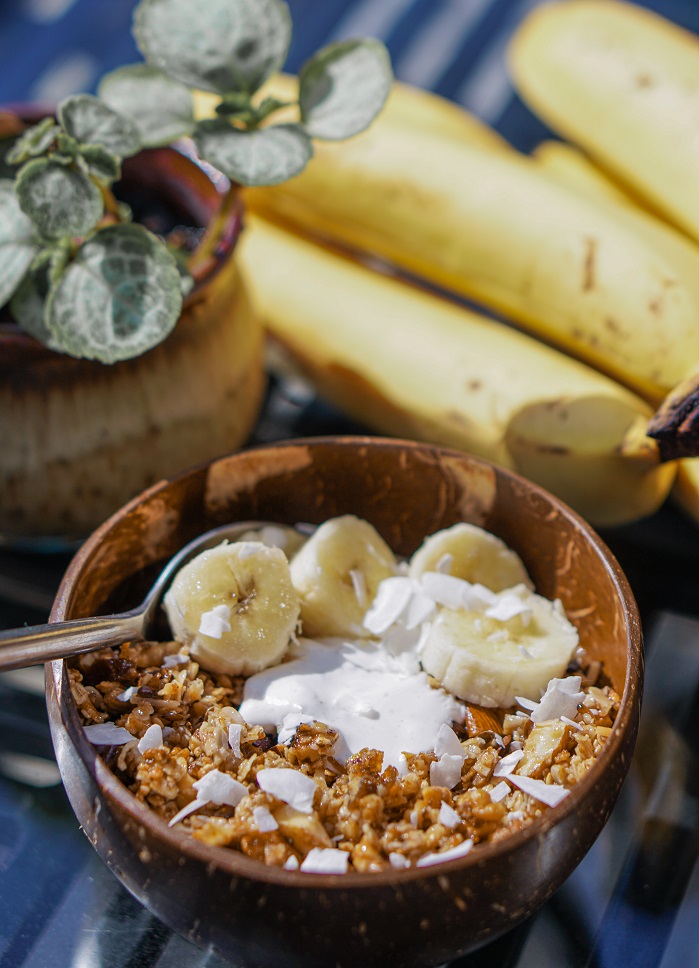 collagen granola in bowl with banana and yoghurt