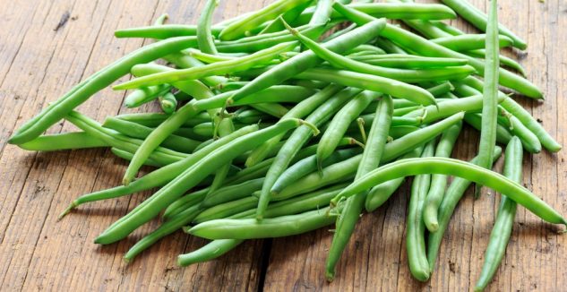 green beans on wood