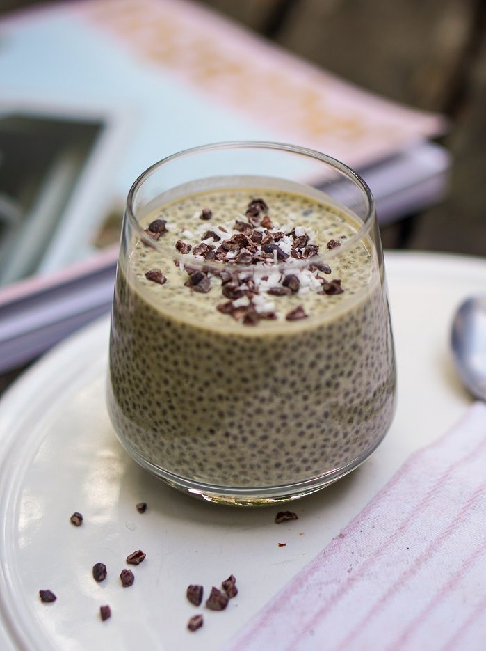 hemp and chia pudding in glass with cacao nibs