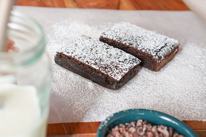 protein brownies covered in icing sugar 