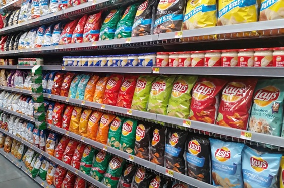 supermarket shelves junk food stock image
