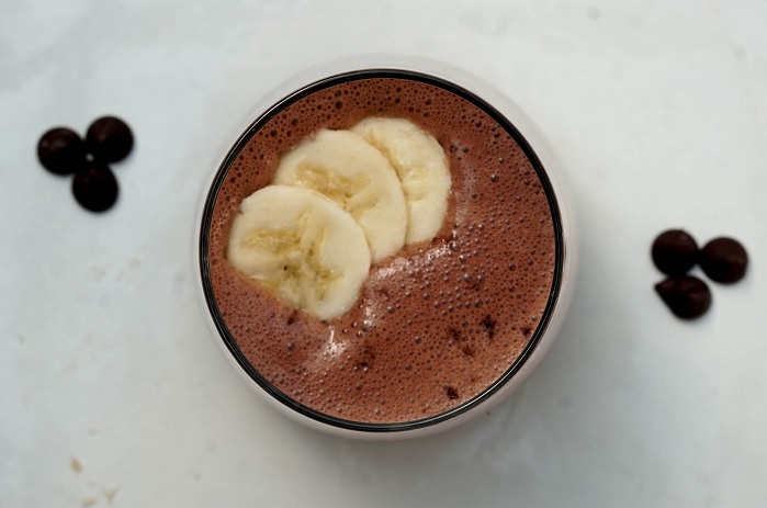 protein smoothie in glass with banana