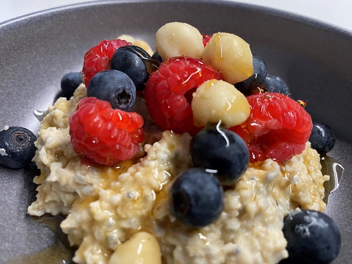 protein overnight oats recipe served in black bowl