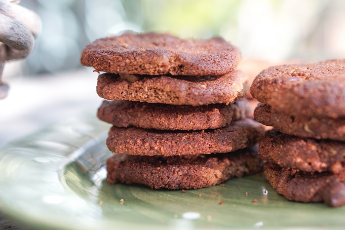 protein pecan cookies baked and stacked on plate