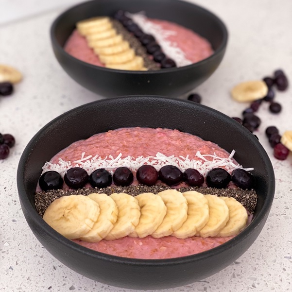 whey protein porridge in black bowl