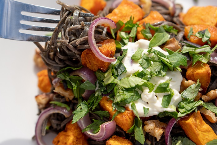 Black Bean roast salad with pumpkin on plate