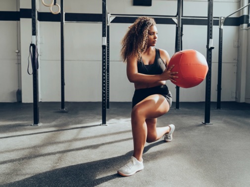 woman in the gym doing ball exercises stock image