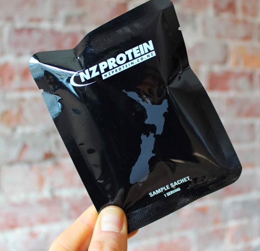 NZProtein sample sachet against brick