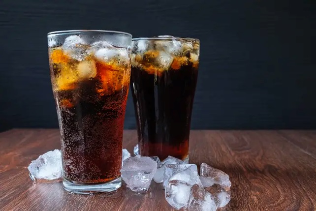 soft drinks in glasses with ice stock image