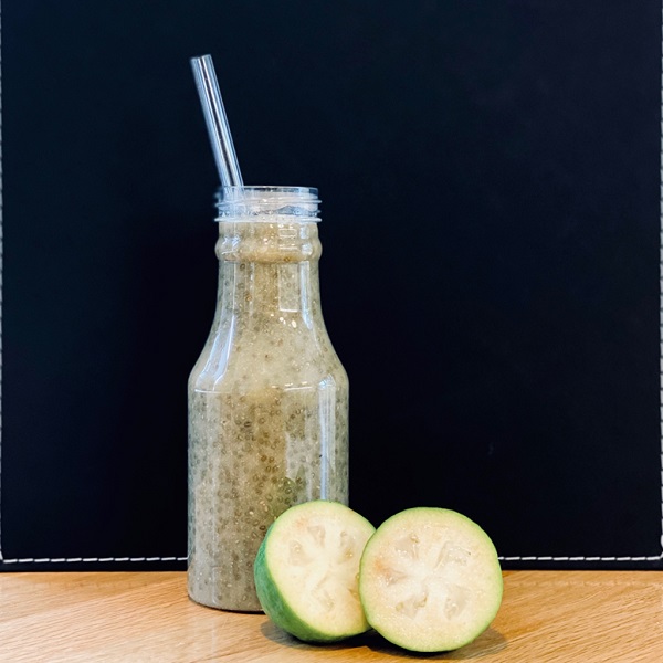 super smoothie on table with feijoas