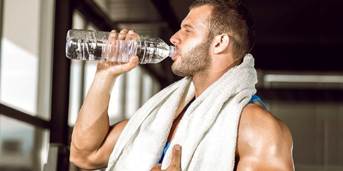 active man drinking water stock image