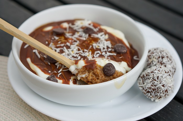 high protein weetbix porridge in a bowl with chocolate