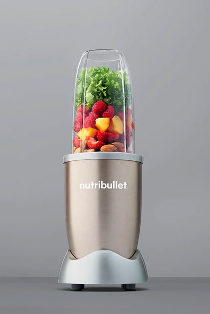 a nutribullet with fruit in it